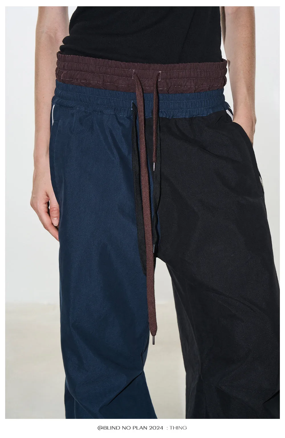 Faux two-piece sports asymmetry pants