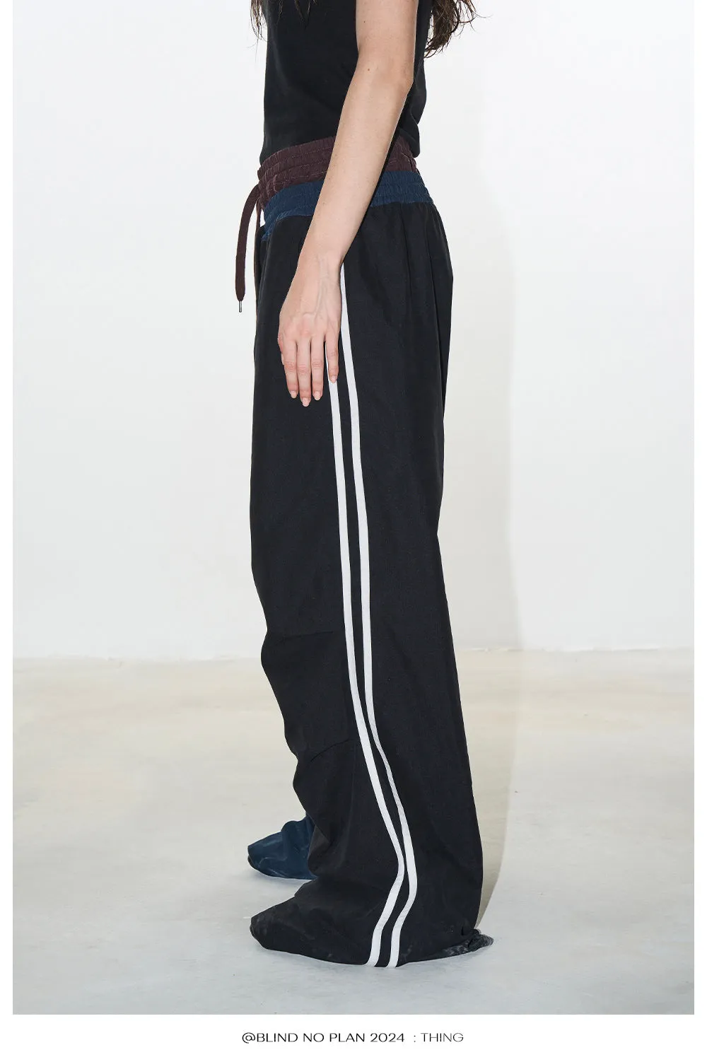 Faux two-piece sports asymmetry pants