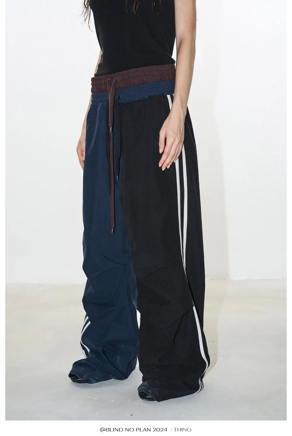 Faux two-piece sports asymmetry pants
