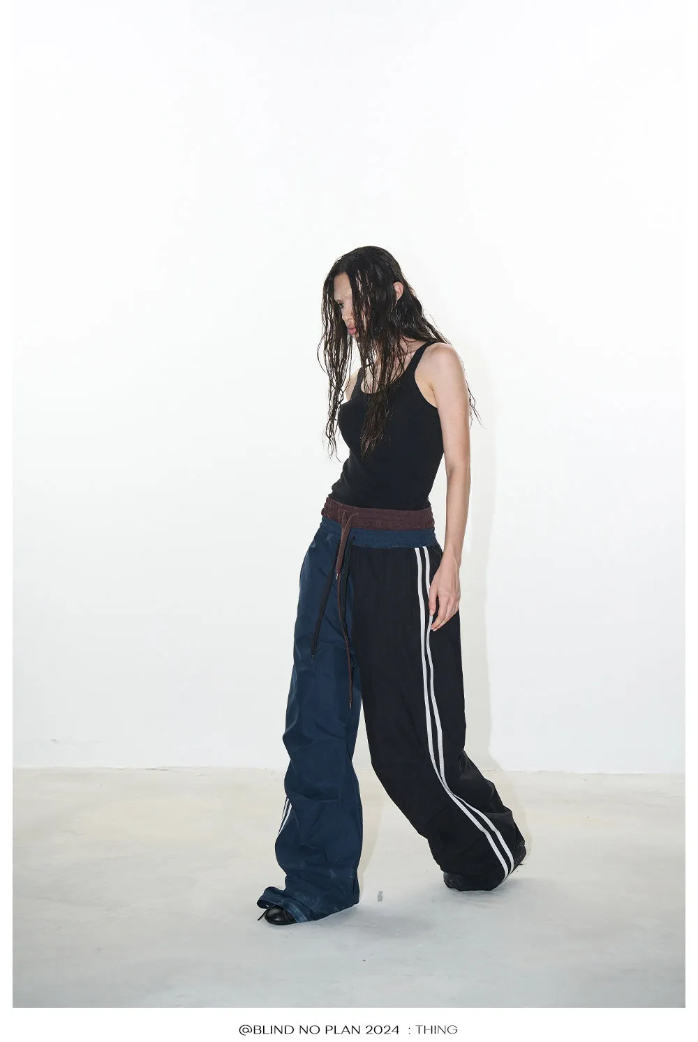 Faux two-piece sports asymmetry pants