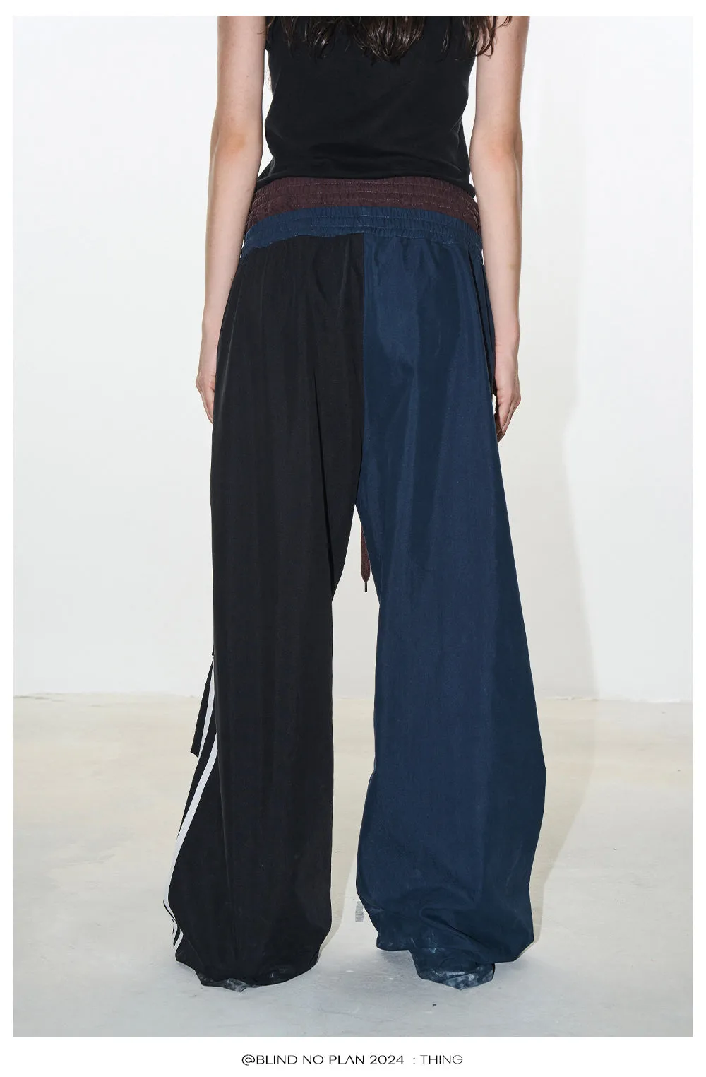 Faux two-piece sports asymmetry pants