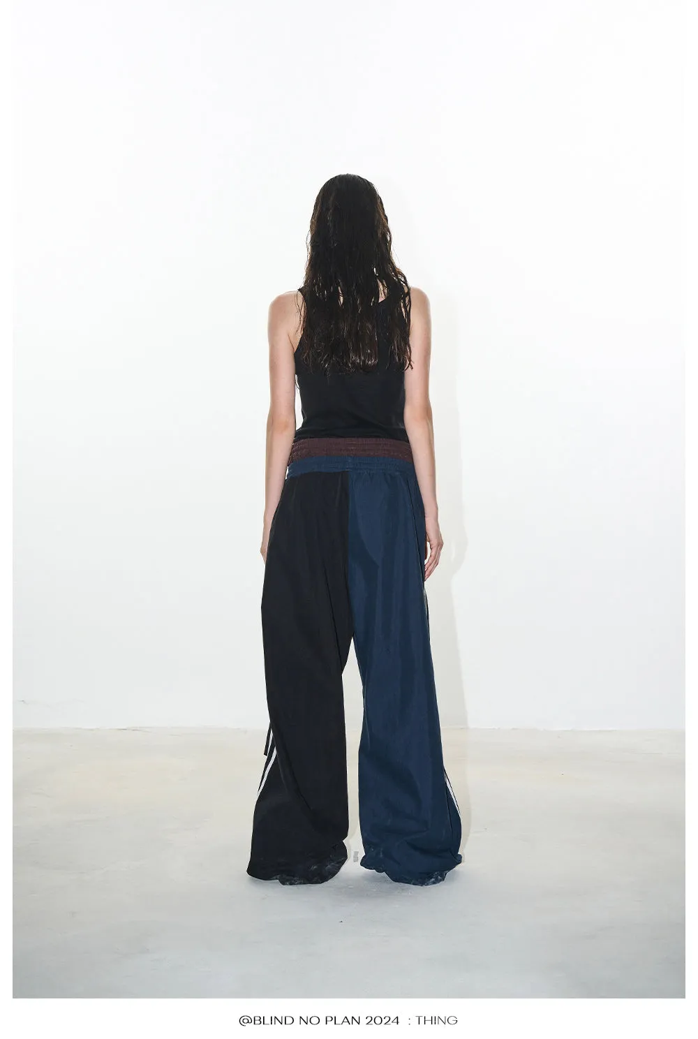 Faux two-piece sports asymmetry pants